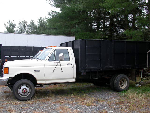 1990 f 350  4wd with 12 ft. flatbed with side