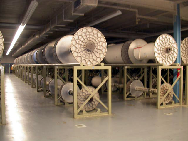 room full of spools on rack