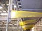 conveyor mounted onto racking